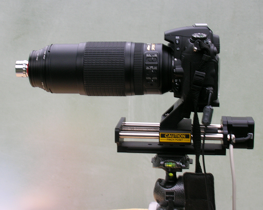 Image of an infinite microscope lens mounted on a camera setup